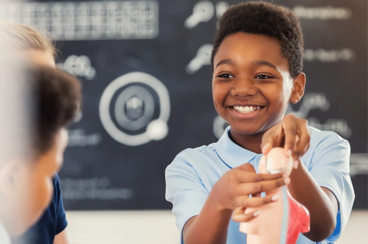 middle school student engaging in stem